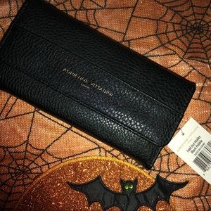 Adrienne Vittadini black pebble leather wallet